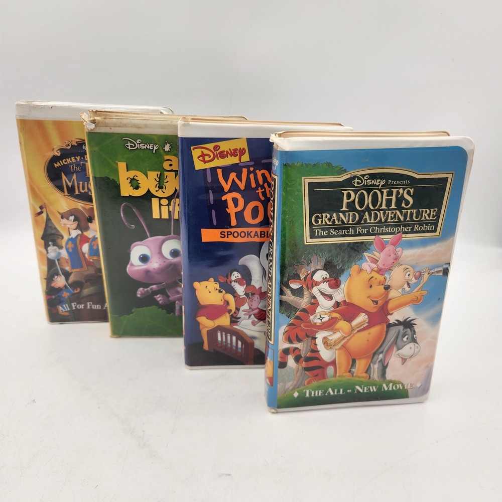 Disney VHS Lot 4 Tapes Winnie the Pooh A Bugs Life Three Musketeers Clamshell